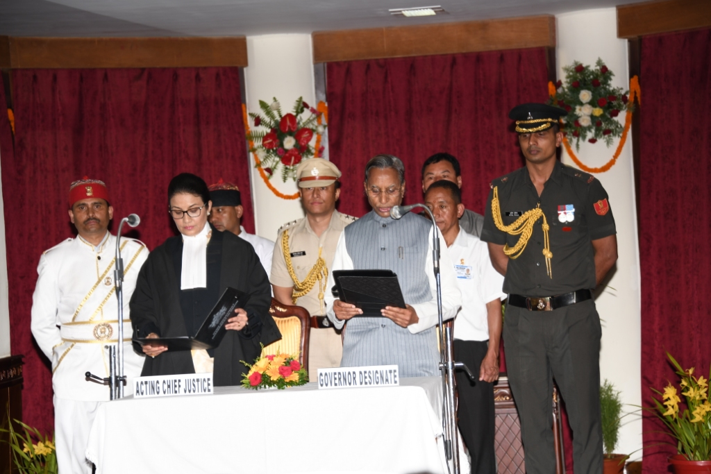 HONORABLE GOVERNOR SHRI GANGA PRASAD SWEARING IN AT RAJ BHAWAN