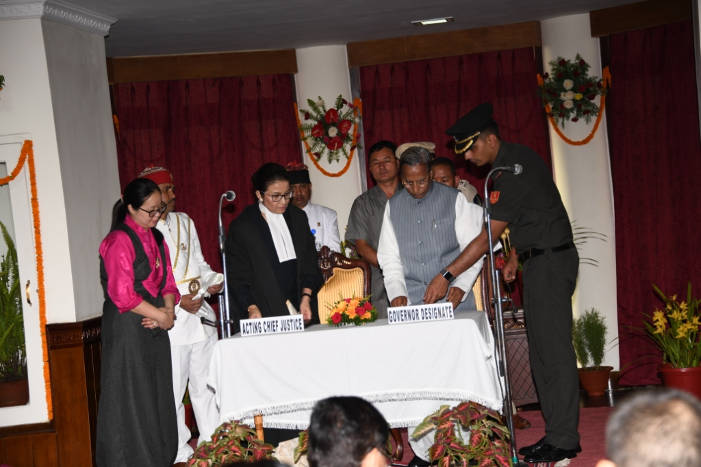 HONORABLE GOVERNOR SHRI GANGA PRASAD SWEARING IN AT RAJ BHAWAN